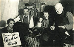 Die Schneiderwerkstatt 1934: Rainer Lachmann mit Vater, Gro&szlig;vater und Schwester Eveline
