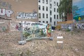 Baulücke mit Graffito: Hier entstehen die Reichenlofts